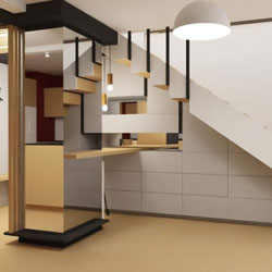 Agencement sous escalier laqué et verni en gris clair